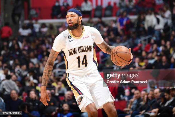 Brandon Ingram of the New Orleans Pelicans handles the ball during the game against the LA Clippers on March 25, 2023 at Crypto.Com Arena in Los...