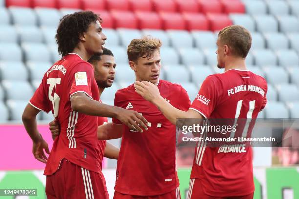 Joshua Zirkzee of FC Bayern Muenchen celebrates scoring the opening goal with his team mates Joshua Kimmich , Serge Gnabry and Michael Cuisance...
