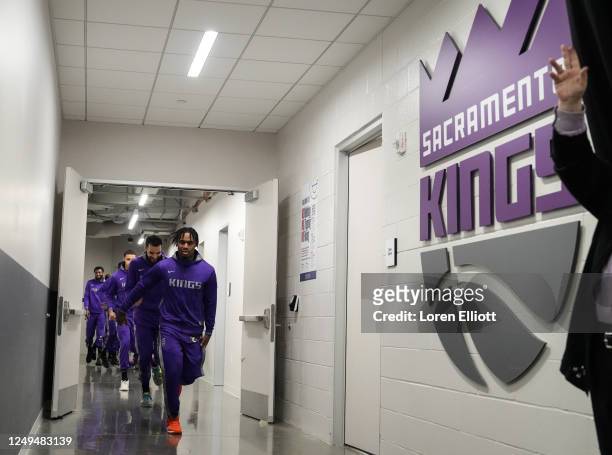Davion Mitchell of the Sacramento Kings leads the team out from the locker room before playing the Utah Jazz at the Golden 1 Center on March 25, 2023...