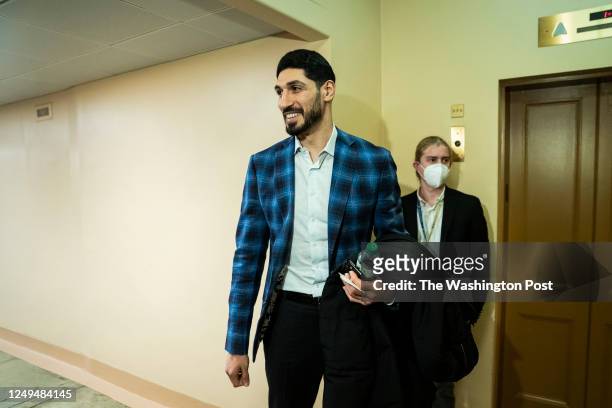 Enes Kanter Freedom, a former National Basketball Association player, walks to a meeting on Capitol Hill on Wednesday, Feb. 16, 2022 in Washington,...