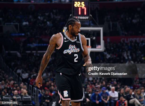 Kawhi Leonard of the Los Angeles Clippers reacts after getting hit in the face during the first half against New Orleans Pelicans at Crypto.com Arena...