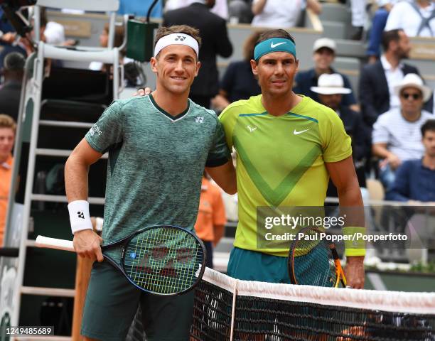 Rafael Nadal of Spain and Casper Ruud of Norway pose before the men's singles final on day fifteen of the French Open at Stade Roland Garros on June...