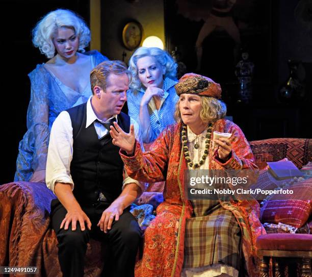 British actors Madeleine Mantock, Geoffrey Streatfeild, Lisa Dillon and Jennifer Saunders performing as Elvira, Charles Condomine, Ruth Condomine and...