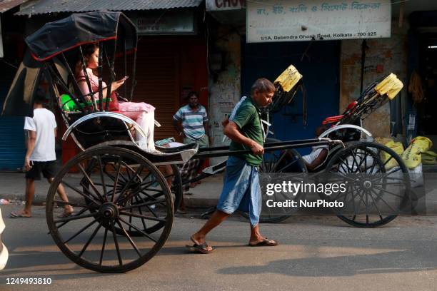 Hand Pulled Rickshaw Photos and Premium High Res Pictures - Getty Images