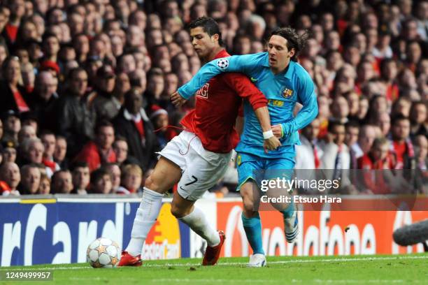 Cristiano Ronaldo of Manchester United and Lionel Messi of Barcelona compete for the ball during the UEFA Champions League Semi Final second leg...