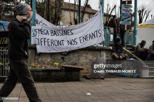 People gather in Melle, central-western France, on March 26 the day after the protest against the construction of new water storage facilities in...