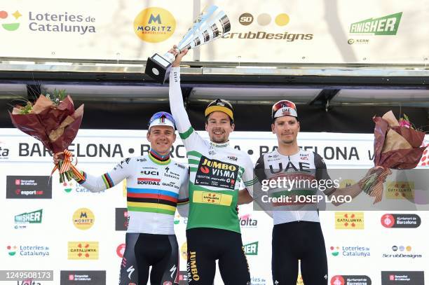 Overall winner Team Jumbo-Visma's Slovenian rider Primoz Roglic , stage winner and overall second-placed Team Quick Step's Belgian rider Remco...