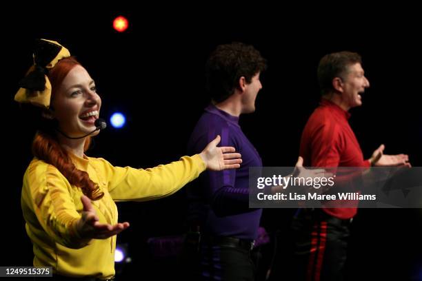 Emma Watkins, Lachlan Gillespie and Simon Pryce of The Wiggles perform on stage during a live-streaming event at the Sydney Opera House on June 13,...