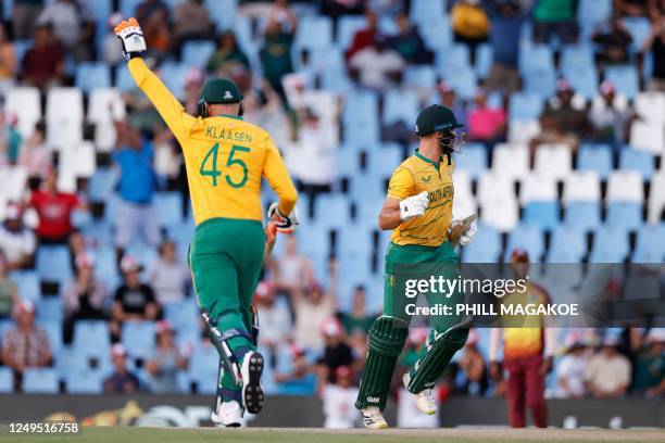 South Africa's Heinrich Klaasen and South Africa's Aiden Markram run between the wickets to make the winning run during the second T20 international...