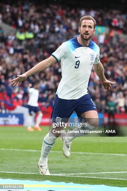 Harry Kane of England celebrates after scoring a goal to make it 1-0 during the UEFA EURO 2024 qualifying round group C match between England and...