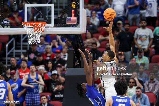 Keshad Johnson of the San Diego State Aztecs shoots the ball over Arthur Kaluma of the Creighton Bluejays during the Elite Eight round of the 2023...
