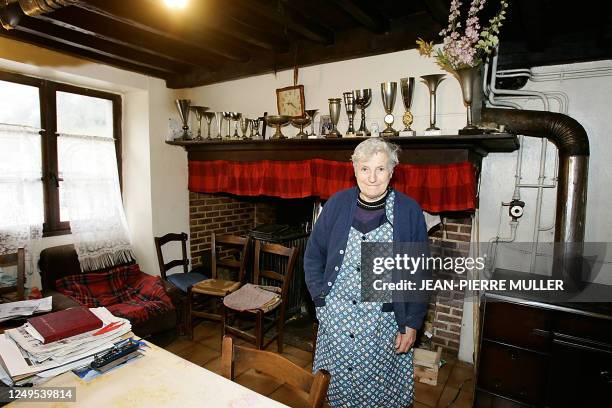 French center-right UDF party deputy Jean Lassalle's mother, Marie Lassalle, poses in her kitchen in Lourdios-Ichere 08 April 2006. Her son is in his...