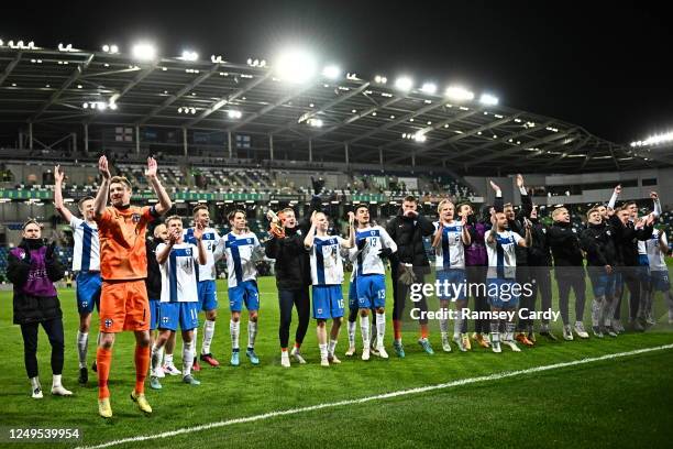 Belfast , United Kingdom - 26 March 2023; Finland players celebrate after their side's victory in the UEFA EURO 2024 Championship Qualifier match...