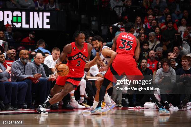 Anunoby of the Toronto Raptors drives to the basket during the game against the Washington Wizards on March 26, 2023 at the Scotiabank Arena in...