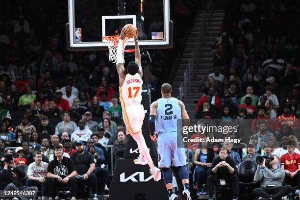 Onyeka Okongwu of the Atlanta Hawks dunks the ball during the game against the Memphis Grizzlies on March 26, 2023 at State Farm Arena in Atlanta,...