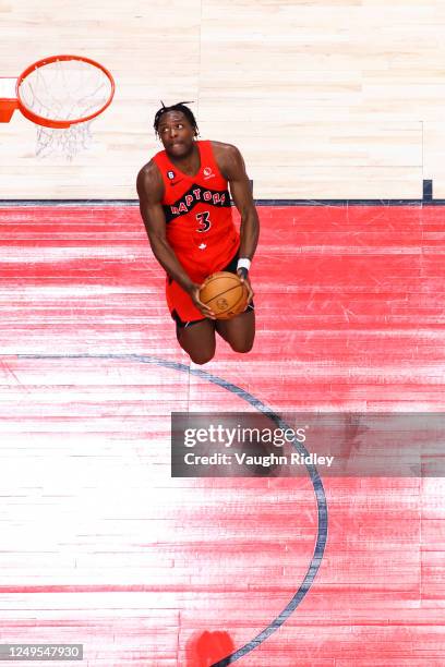 Anunoby of the Toronto Raptors drives to the basket during the game against the Washington Wizards on March 26, 2023 at the Scotiabank Arena in...