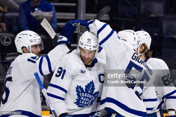 Toronto Maple Leafs celebrate a goal scored by Alexander Kerfoot against the Nashville Predators during the second period at Bridgestone Arena on...