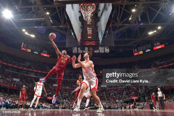 Donovan Mitchell of the Cleveland Cavaliers drives to the basket during the game against the Houston Rockets on March 26, 2023 at Rocket Mortgage...