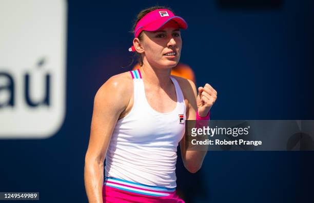 Ekaterina Alexandrova in action against Belinda Bencic of Switzerland in her third-round match on Day 8 of the Miami Open at Hard Rock Stadium on...