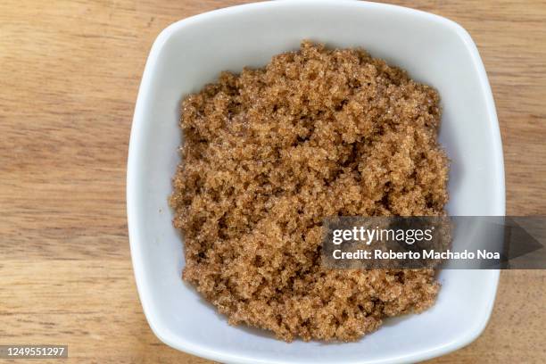 brown sugar on a white container - brown sugar stock pictures, royalty-free photos & images