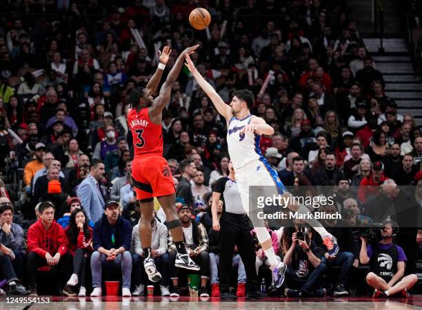 Anunoby of the Toronto Raptors shoots against Deni Avdija of the Washington Wizards during the second half of their basketball game at the Scotiabank...