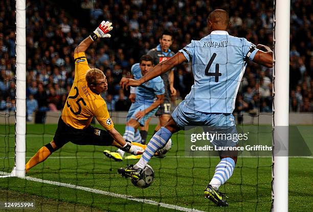 Vincent Kompany of Manchester City clears the ball from the line during the UEFA Champions League Group A match between Manchester City and SSC...