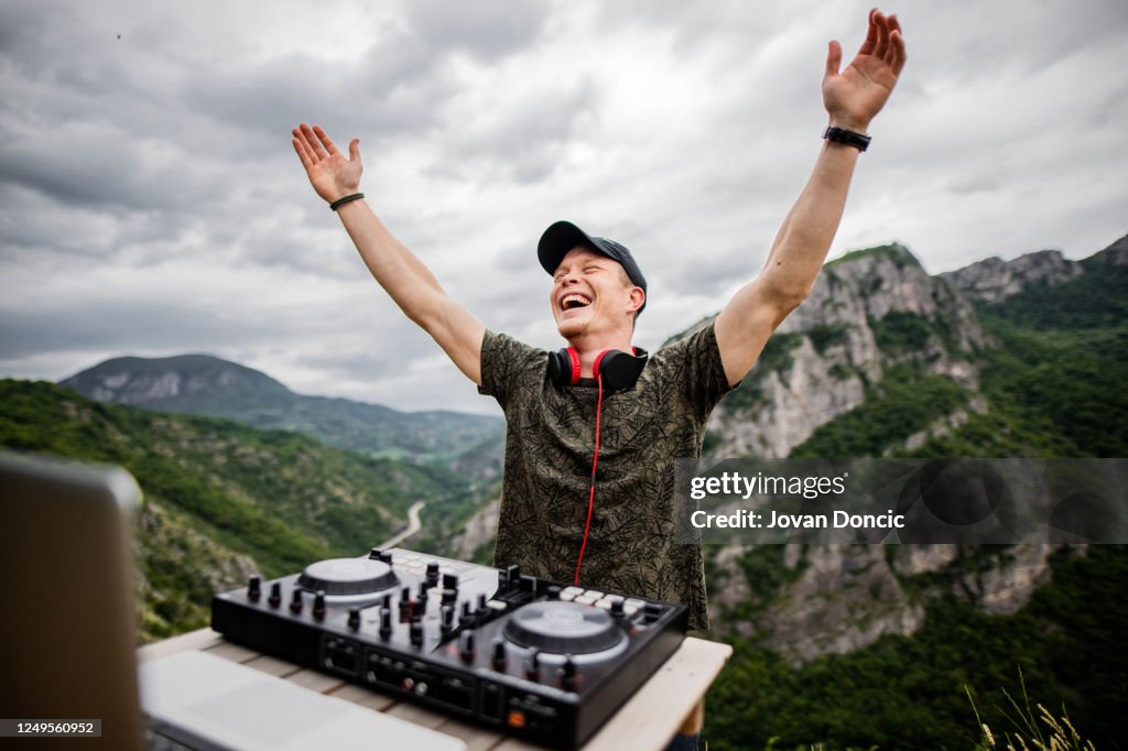 Dj playing music in nature