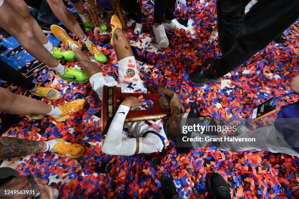 The LSU Lady Tigers celebrate after defeating the Miami Hurricanes during the Elite Eight round of the 2023 NCAA Women's Basketball Tournament held...