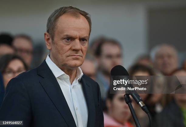 Donald Tusk, Chairman of the Civic Platform opposition party, addresses the press at the Szyb Gallery in Katowice, surrounded by party members, on...