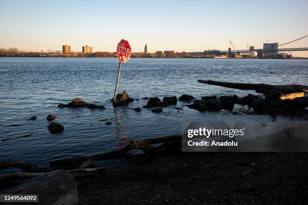 Stop sign in the Delaware River at Penn Treaty Park in Philadelphia, Pa., on March 26, 2023. Water in Philadelphia has been deemed unsafe to drink...