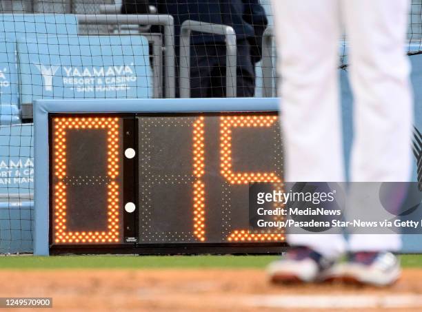 Los Angeles, CA The new time clock during a exhibition baseball game between the Los Angeles Dodgers and the Los Angeles Angels at Dodger Stadium in...
