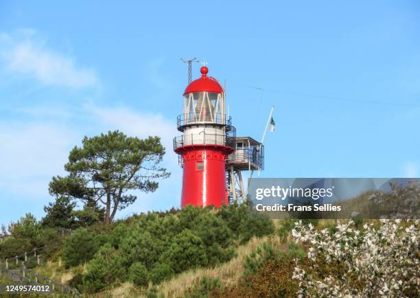 the lighthouse vuurduin on vlieland, one of the dutch wadden islands - vlieland stock pictures, royalty-free photos & images