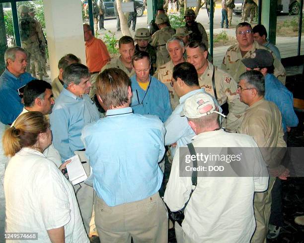 Deputy Defense Secretary Paul Wolfowitz briefs media after a terrorist attack 26 October, 2003 on the Al Rasheed hotel in Baghdad, where he was...