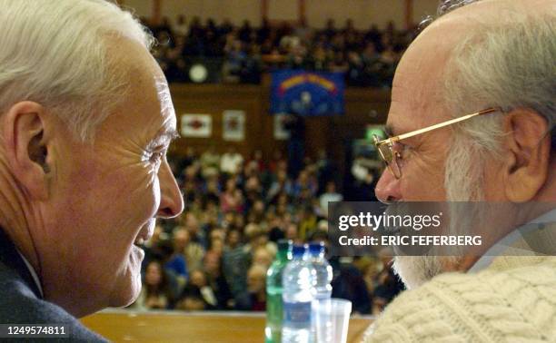 Vietnam war veteran, Ron Kovic talks to Labour party retired member of Parliament Tony Benn during a rally organised by "Stop the War" organisation,...