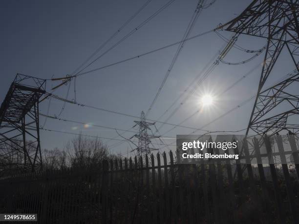 High voltage electricity transmission towers at Rye House power station, operated by VPI Power Ltd., in Hoddesdon, UK, on Tuesday, Feb. 14, 2023....
