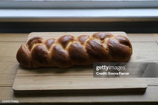 plaited loaf of bread - braided bread stock pictures, royalty-free photos & images