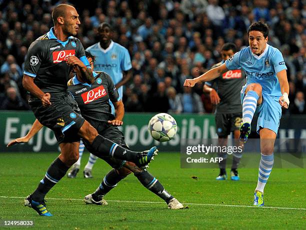 Manchester City's French midfielder Samir Nasri shoots during the UEFA Champions league group A football match between Manchester City and Napoli at...