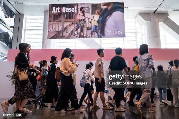 Visitors and collectors attend the Art Basel Hong Kong show after several years of remote and hybrid events due to covid restrictions in Hong Kong.