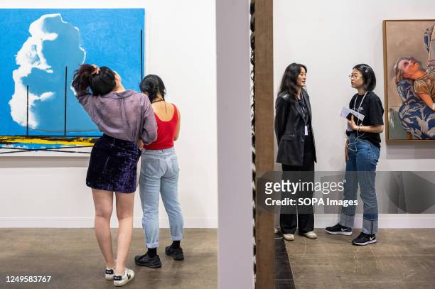 Visitors and collectors attend the Art Basel Hong Kong show after several years of remote and hybrid events due to covid restrictions in Hong Kong.