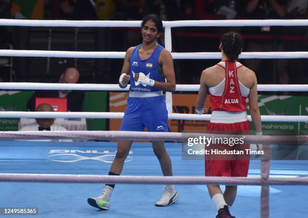 Indian boxer Nitu Ghanghas and Alua Balkibekova of Kazakhstan in-action during the Semi final match 2023 IBA Women's Boxing World Championships at IG...