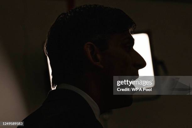 Prime Minister Rishi Sunak in silhouette as he speaks to an audience while attending a Q&A session during a Connect event at Chelmsford Boys Club on...