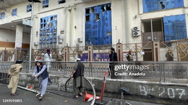 Security Forces guard near site which was damaged in a suicide bomb attack in Kabul, Afghanistan on March 27, 2023. A suicide bomber blew himself up...