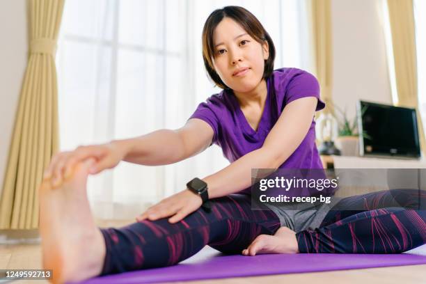 Hamstring Clothes 52 Hamstring Stretch Home Stock Photos, High-Res Pictures, and Images ...