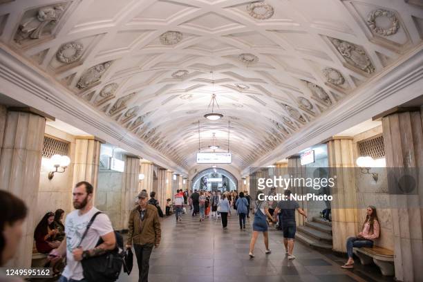 People walking into Teatralnaya underground train station in Moscow, Russia, on May 19, 2019. Teatralnaya is considered among most beautiful metro...