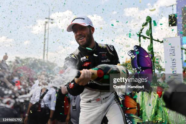 Sao Paulo, Brazil In this handout from Jaguar Racing, Sam Bird, Jaguar TCS Racing, 3rd position, sprays Champagne on the podium during the ABB FIA...