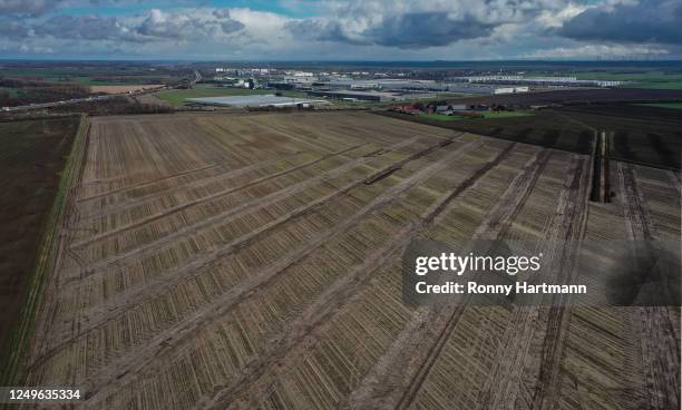 In this aerial view an archeological excavation is pictured on the site of a planned new Intel chip factory on March 27, 2023 near Magdeburg,...