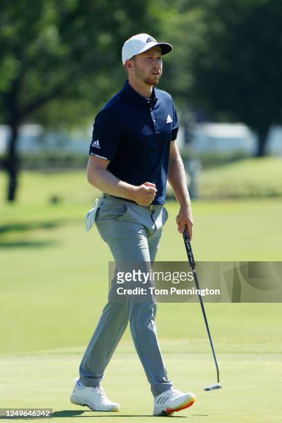 Daniel Berger of the United States reacts to his birdie on the 18th green during the final round of the Charles Schwab Challenge on June 14, 2020 at...
