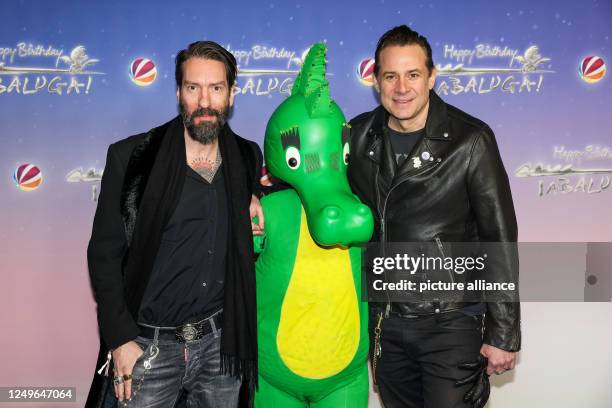 March 2023, Berlin: Alec Völkel and Sascha Vollmer from The Boss Hoss arrive at the premiere of the Sat.1 show "Happy Birthday Tabaluga!" at Zoo...