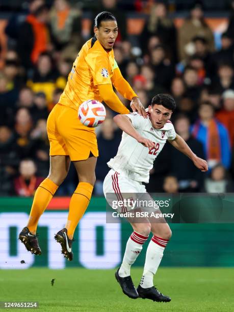 Virgil van Dijk of the Netherlands and Graeme Torrilla of Gibraltar during the UEFA EURO 2024 Qualifying Round Group B match between Netherlands and...