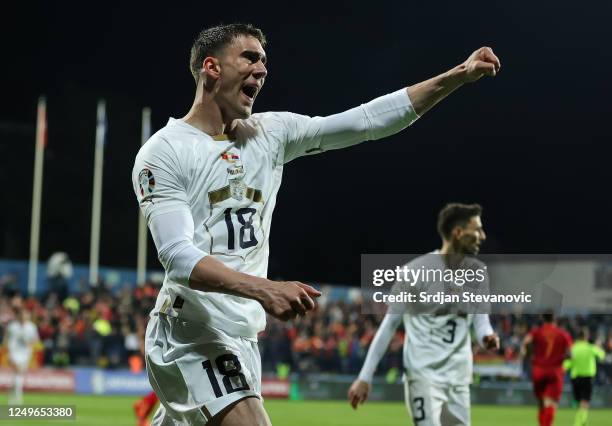 Dusan Vlahovic of Serbia celebrates after scoring a goal during the UEFA EURO 2024 qualifying round group B match between Montenegro and Serbia at...